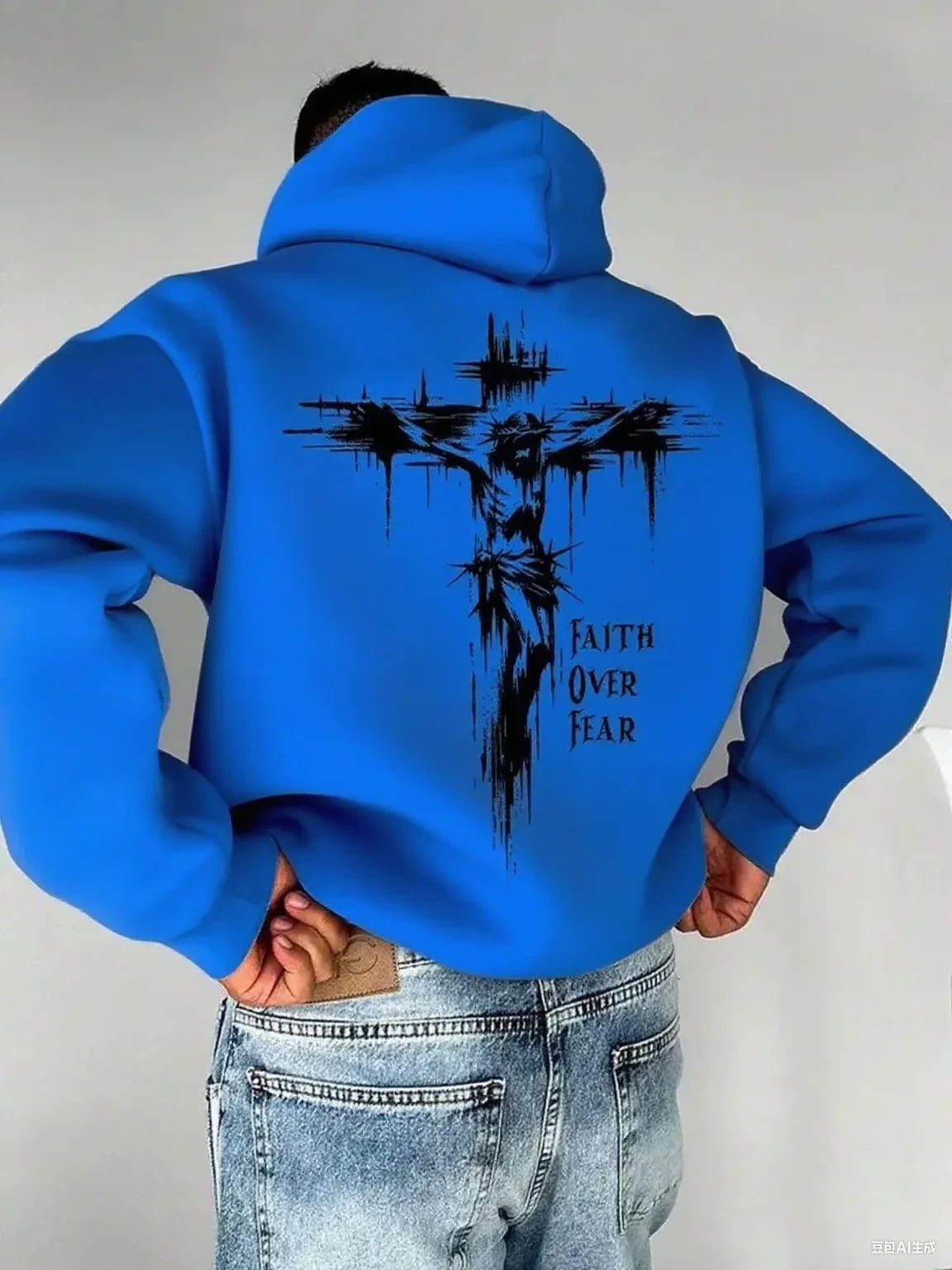 A men's hoodie with the words "Christian faith Overcomes fear" printed on it features a cross-shaped design on the back