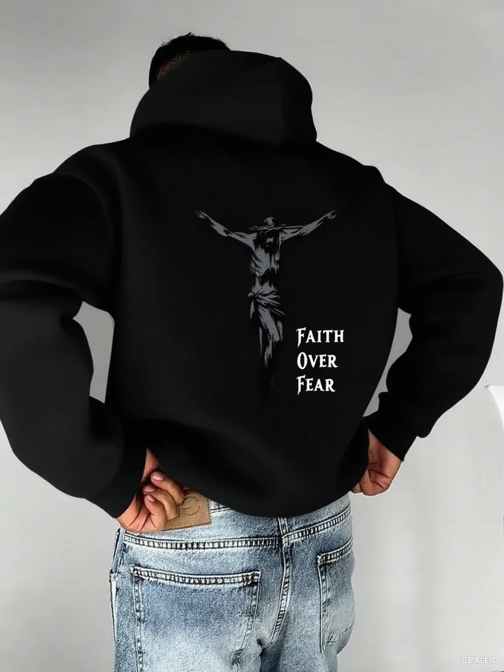 A men's hoodie with the words "Christian faith Overcomes fear" printed on it features a cross-shaped design on the back